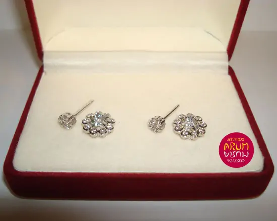 Two earrings in one with brilliants 0,60 qts "SOLD"