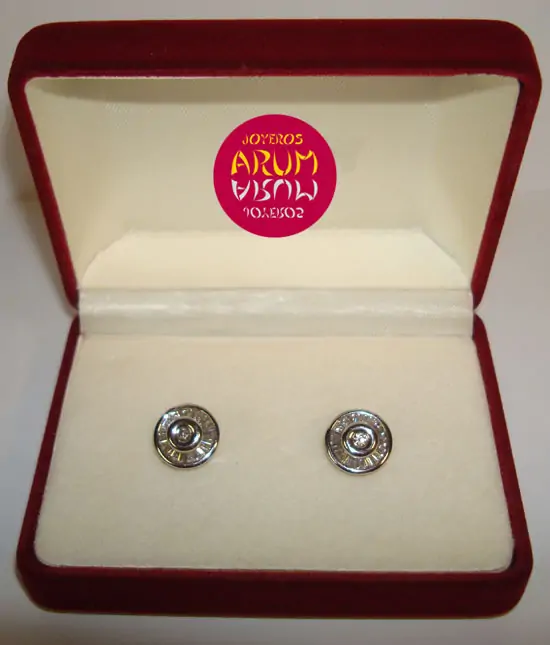 Two earrings in one with brilliants and bagués "SOLD"